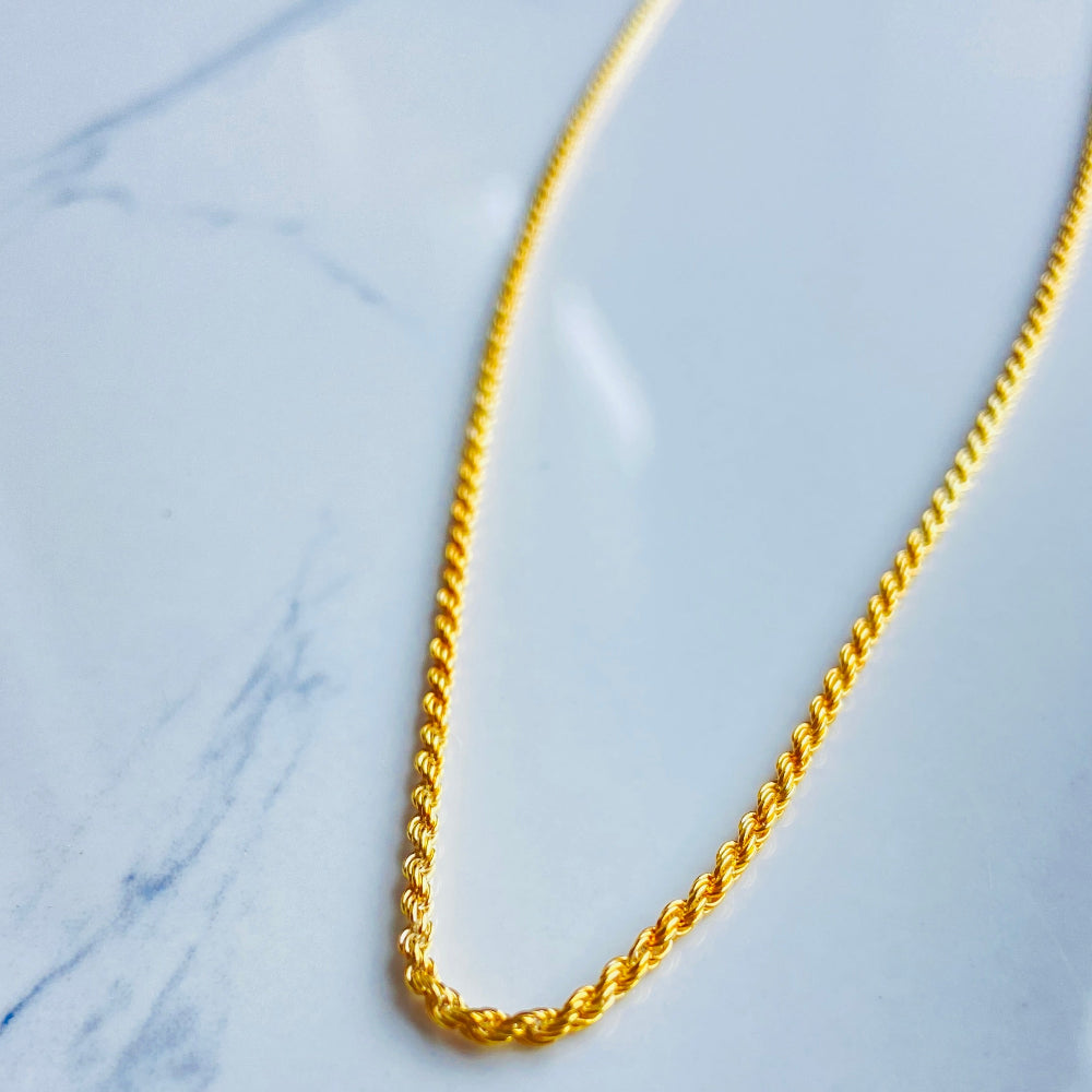 Gold chain on a marble surface Gold chain on a marble surface gold rope chain men women ladies gents queens kings 925 silver sterling silver exclusive design affordable luxury trending pieces Deep Shine Jewellers jewellery jewelry gold plated golden Your Time To Shine DSJ quality premium beauty