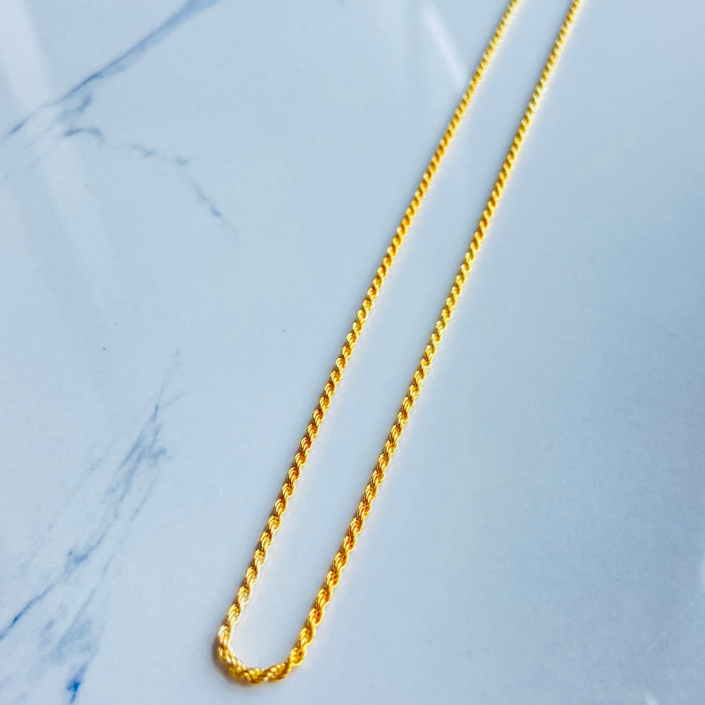 Gold chain on a marble surface Gold chain on a marble surface gold rope chain men women ladies gents queens kings 925 silver sterling silver exclusive design affordable luxury trending pieces Deep Shine Jewellers jewellery jewelry gold plated golden Your Time To Shine DSJ quality premium beauty