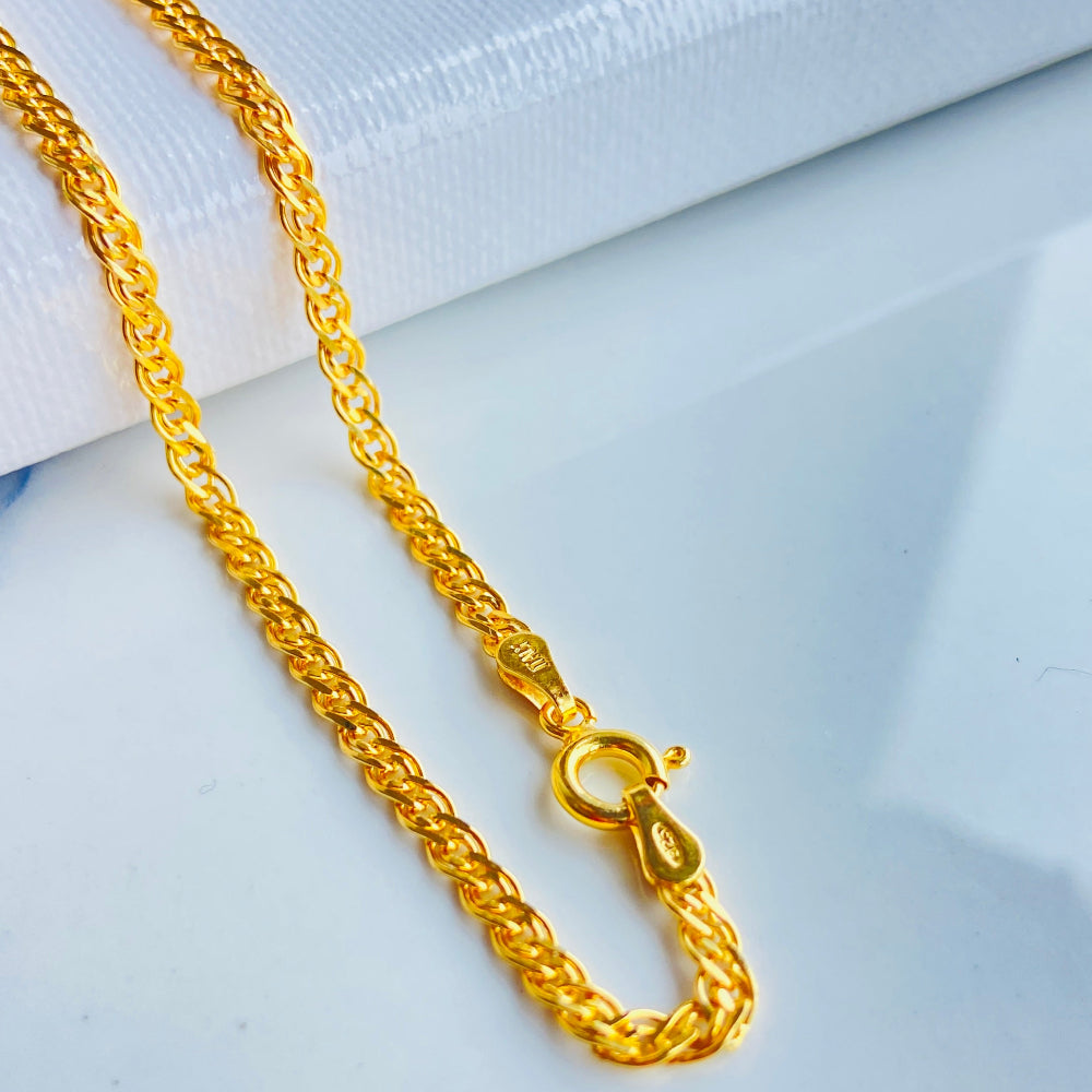 Gold chain necklace on a light blue background gold fancy chain necklace women ladies queen 925 silver sterling silver gold plate golden best seller trending buy now premium jewellery jewelry high quality exclusive craftsmanship Deep Shine Jewellers DSJ Your Time To Shine online store 
