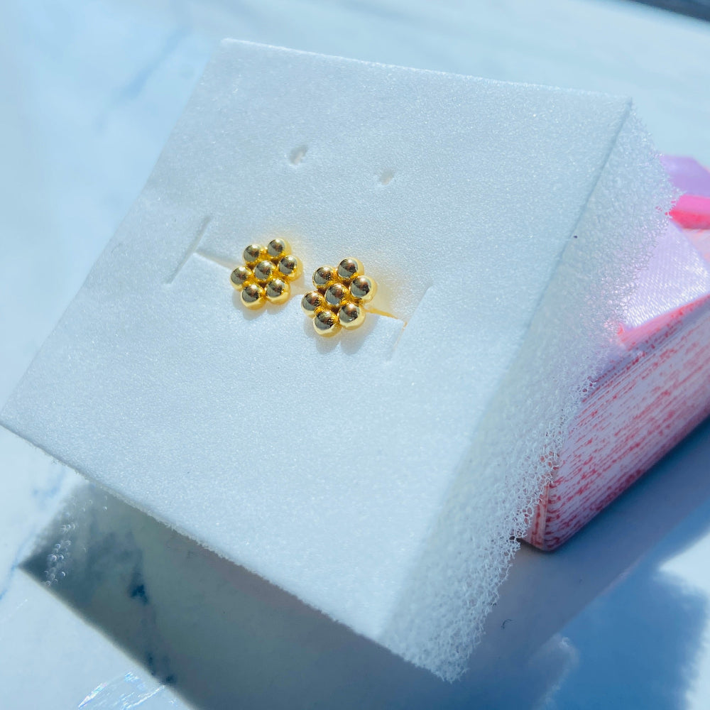 Gold earrings with gemstones on a white stand against a blue background gold round bee hive earring for men women ladies gents kings queens 925 silver sterling silver gold plated golden exclusive craftsmanship Deep Shine Jewellers jewellery jewelry Your Time To Shine DSJ Trending Shop now