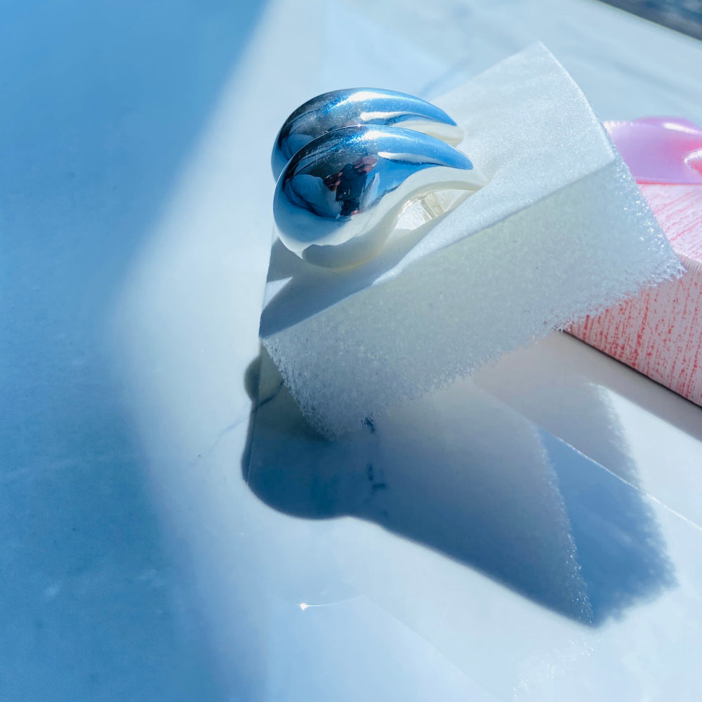 Blue and white ceramic item on a white surface with a blue background silver drop form earrings for women ladies queens silver 925 silver sterling silver exclusive jewellery jewelry by Deep Shine Jewellers Your Time To Shine DSJ shinning beauty