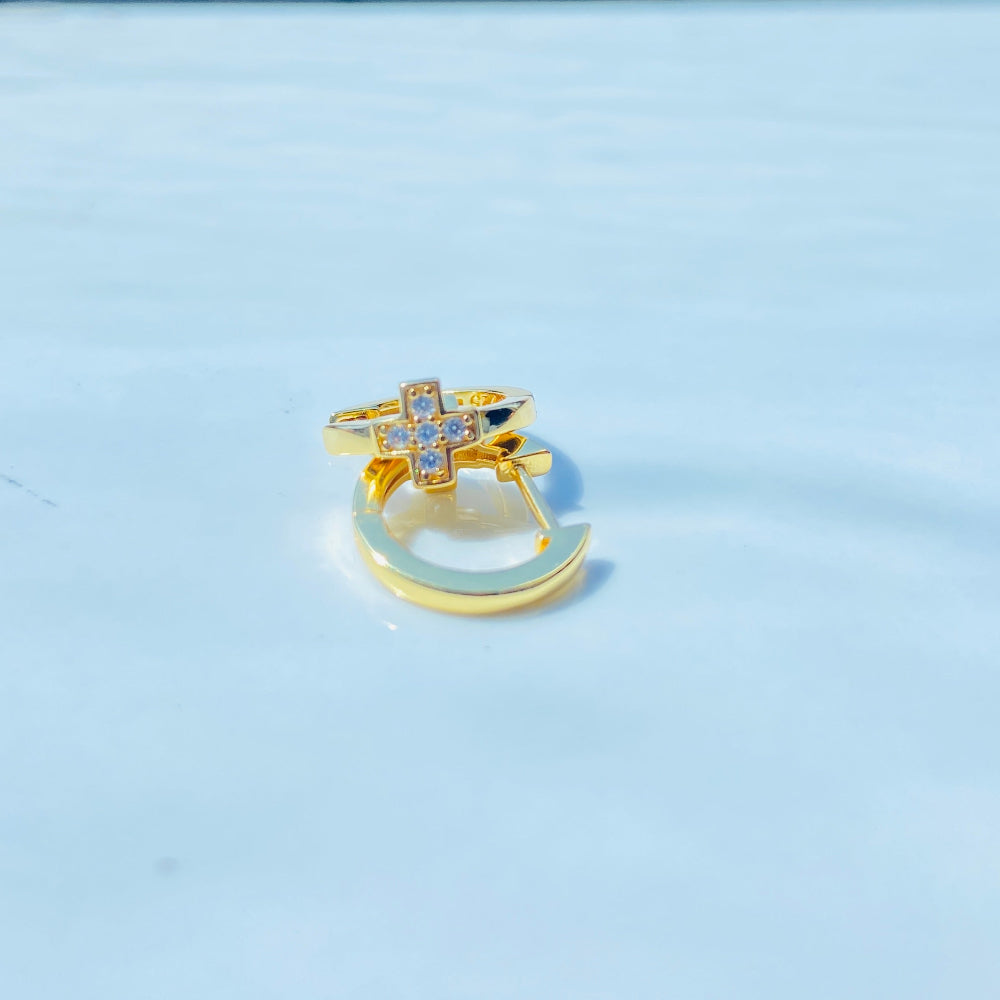 Gold ring with gemstones on a light blue background gold plus ice sleeper hoop earrings for women ladies queens 925 silver sterling silver cubic zirconia diamonds lab diamonds exclusive Deep Shine Jewellers jewellery jewelry trending Your Time To Shine DSJ