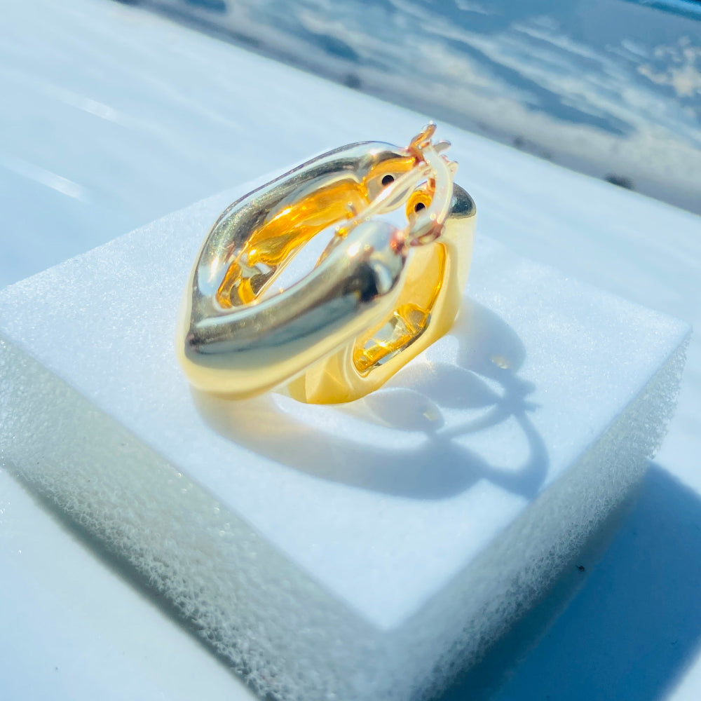 Gold ring on a white stand with a blue background Gold hoop earrings on a light blue background Gold block bubble hoop earring 925 silver sterling silver earrings for women ladies queens shine bright with DSJ exclusive Deep Shine Jewellers jewellery jewelry trendy new affordable luxury Your Time To Shine 