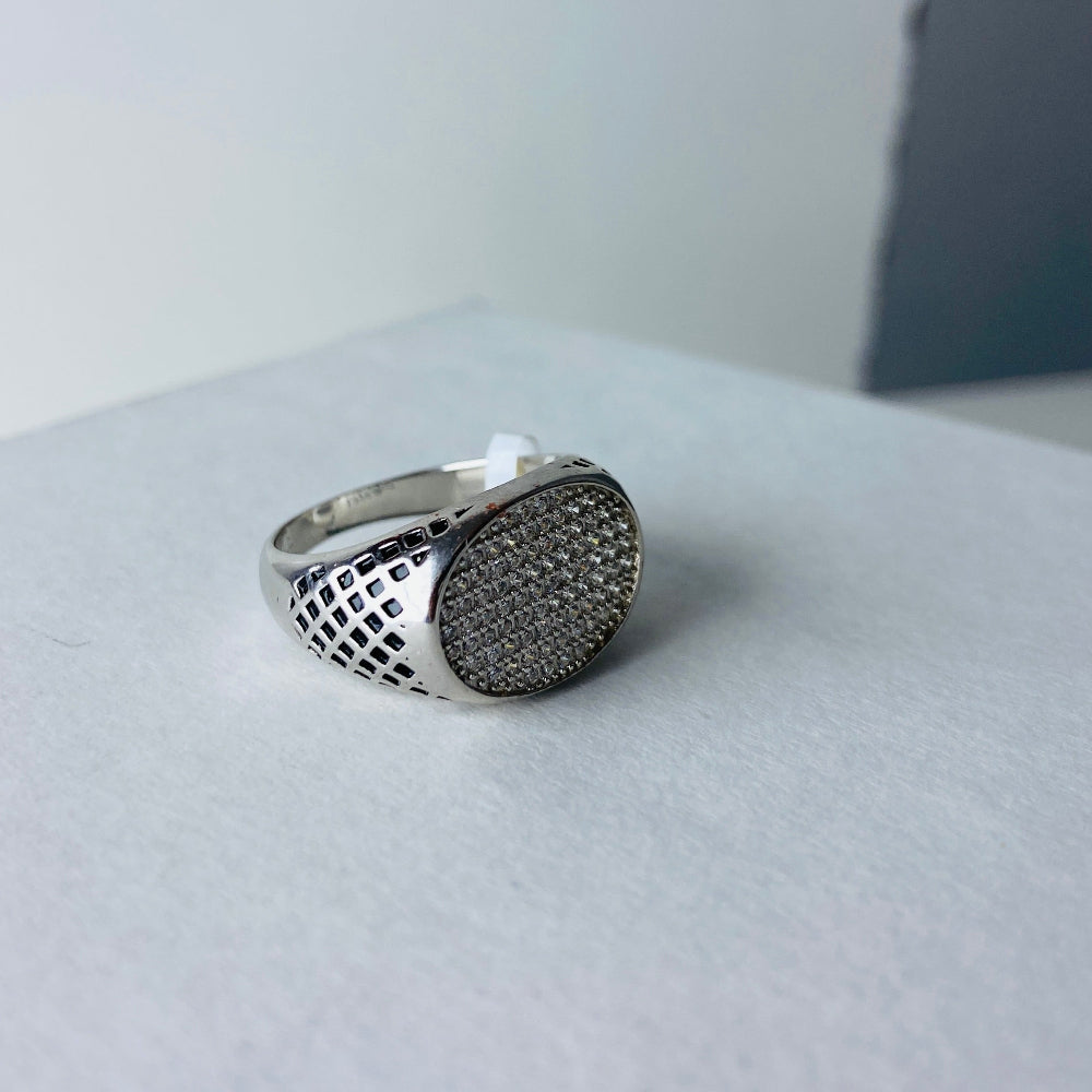 Silver ring with textured design on a light gray surface silver ice ring mens gents kings diamonds lab diamonds gemstones 925 silver sterling silver black enamel cubic zirconias band ring exclusive craftsmanship affordable luxury premium materials high quality jewellery jewelry Deep Shine Jewellers DSJ Your Time To Shine best sellers unique pieces trending christmas sale gifts presents 