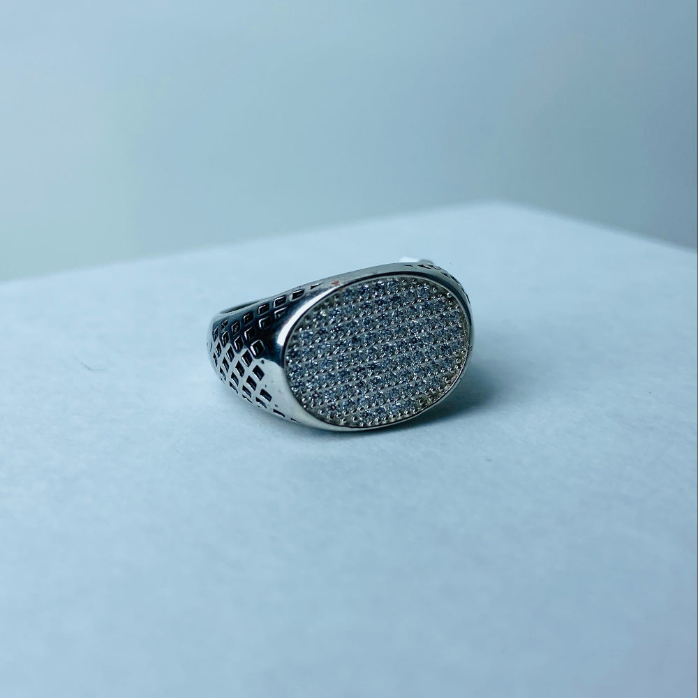 Silver ring with gemstones on a white cushion against a light gray background Silver ring with textured design on a light gray surface silver ice ring mens gents kings diamonds lab diamonds gemstones 925 silver sterling silver black enamel cubic zirconias band ring exclusive craftsmanship affordable luxury premium materials high quality jewellery jewelry Deep Shine Jewellers DSJ Your Time To Shine best sellers unique pieces trending christmas sale gifts presents 