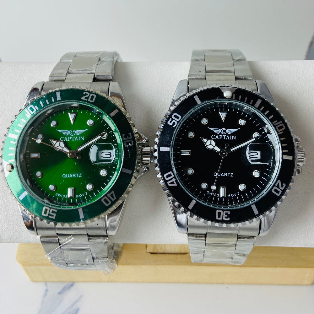 Two watches with green and black faces on a white background Silver watch with black dial on a white surface captain mens watch black dial stainless steel rotating bezel quartz movement swiss movement timepiece watches timeless elegance brand new polished watched sapphire crystal hour markings jewellery jewelry premium quality affordable luxury best sellers trending shop now Deep Shine Jewellers DSJ Your Time To Shine mens gents kings 