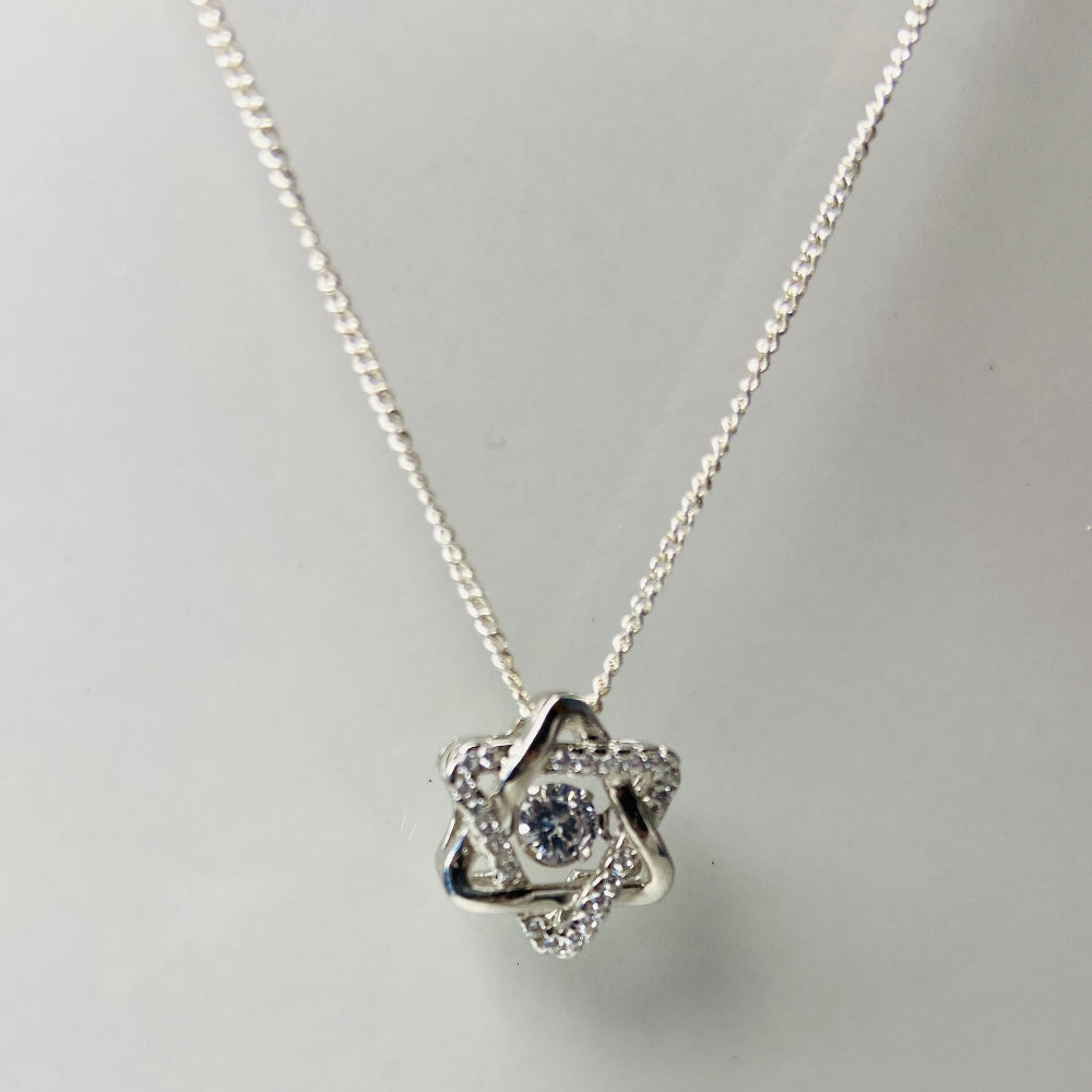 Silver necklace with a floral pendant on a marble surface white gold silver dancing diamond pendant necklace chain diamond cubic zirconia gemstone lab diamond exclusive craftsmanship affordable luxury premium jewellery jewelry ladies women queens Deep Shine Jewellers DSJ Your Time To Shine best seller trending 925 silver sterling silver 