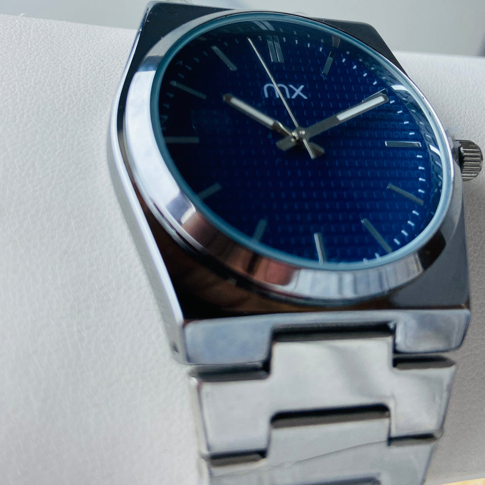 Silver watch with a blue face on a white background silver watch with navy face on a white marble surface silver MX mens watch stainless steel watches timepiece timeless luxury best seller trending Deep Shine Jewellers DSJ Your Time To Shine quartz movement black dial silver stick markers 36mm silver bezel christmas presents gifts holiday season festive season xmas christmas sale Cape town south africa 