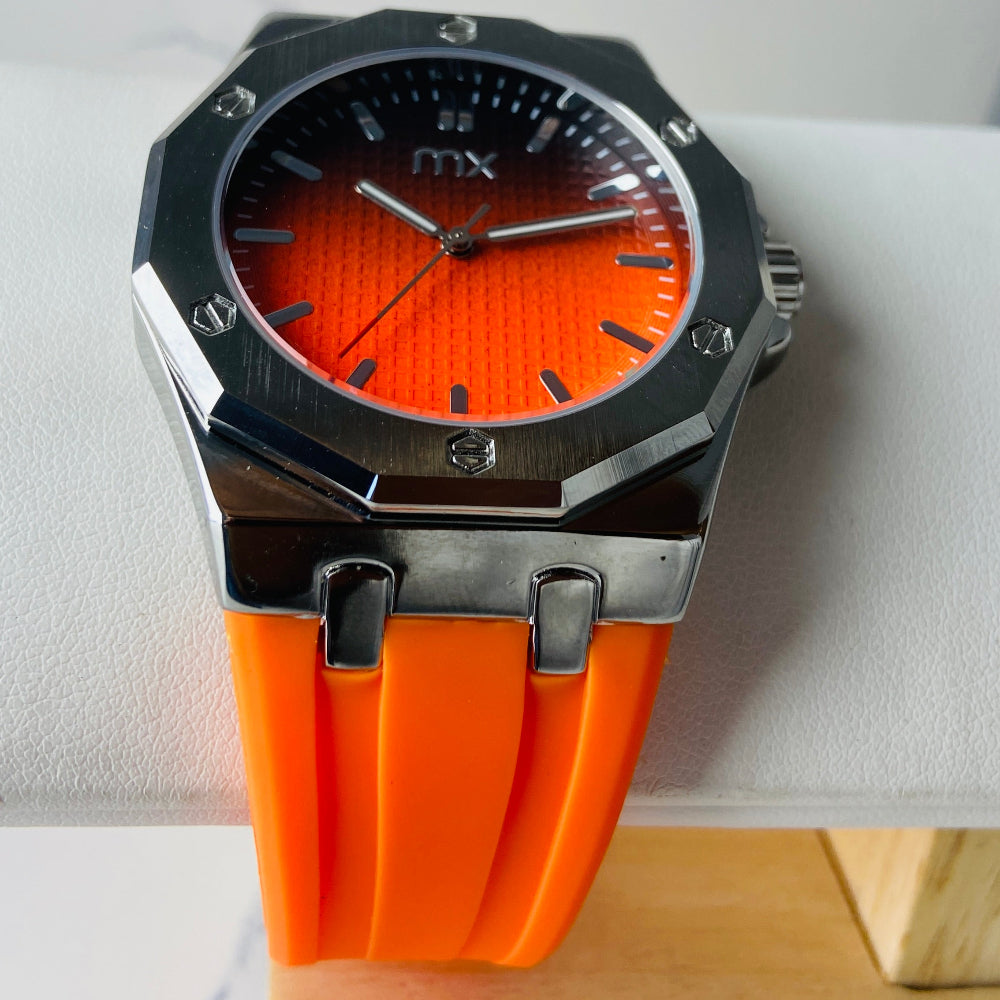 Wristwatch with orange strap and red face on a white background silver watch with black and orange face on a white marble surface MX mens watch stainless steel watches timepiece timeless luxury best seller trending Deep Shine Jewellers DSJ Your Time To Shine quartz movement black dial gold stick markers 36mm gold bezel rubber strap orange christmas sale xmas present holiday season festive season 