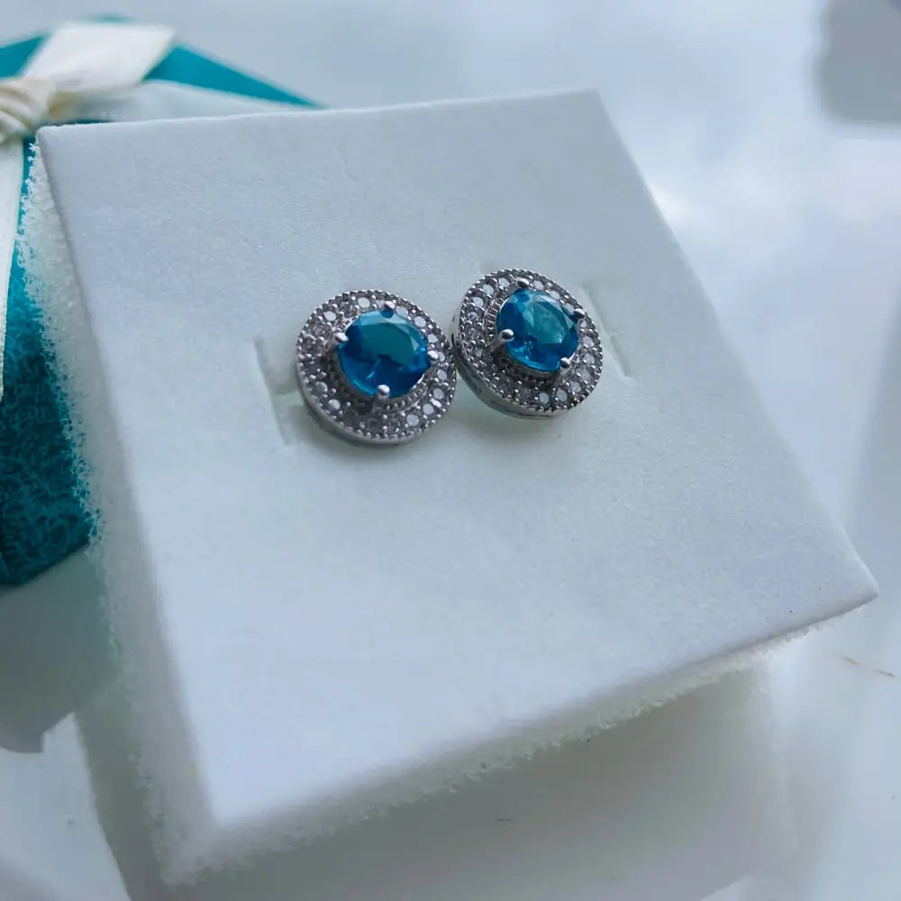 Aqua Radiance white gold silver earrings with round blue gemstone and white stones