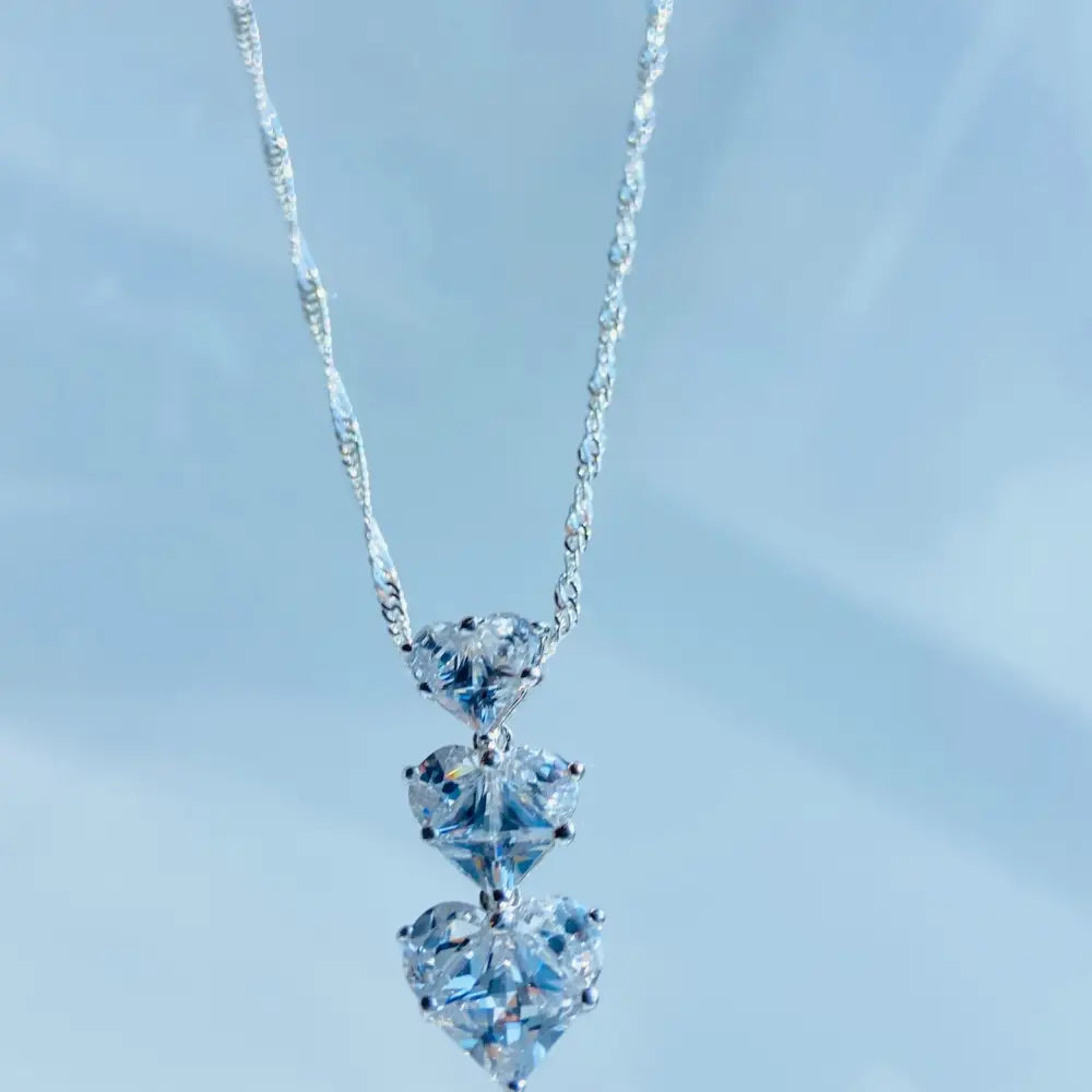 Silver three tier necklace with three heart-shaped clear gemstone pendants in white gold shine. Jewellery silver jewellery Deep Shine Jewellers