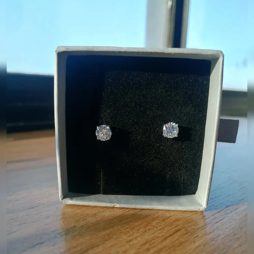 Deep Shine Silver Cubic Claw Earrings featuring round brilliant-cut diamond stud earrings in presentation box