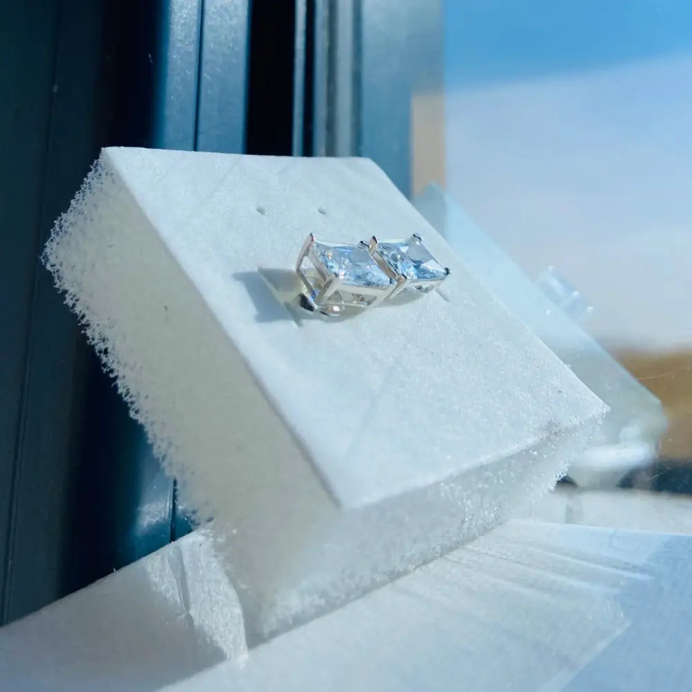 Silver rectangle four stud earrings in white gold silver with clear square-cut gemstones