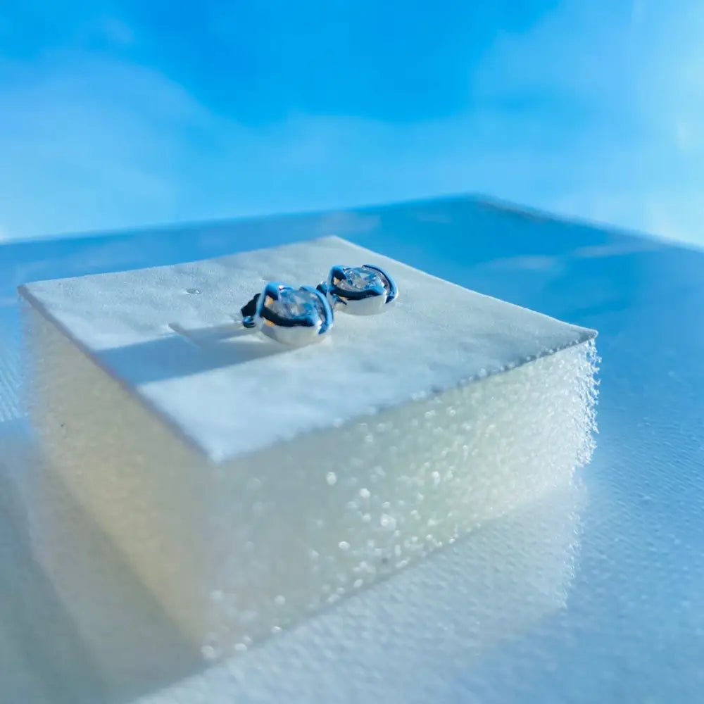 Deep Shine White Gold Silver Rose Earrings featuring round clear diamond studs