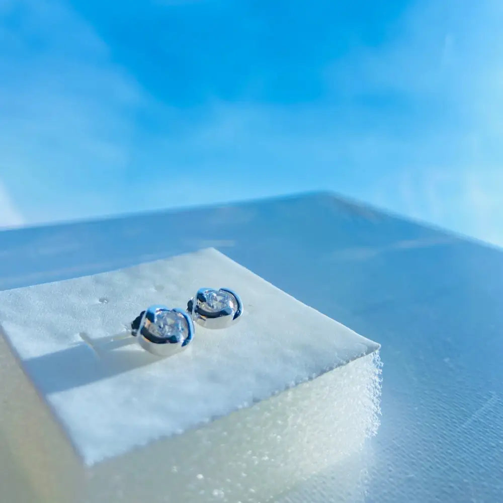 Deep Shine White Gold Silver Rose Earrings featuring round clear diamond studs