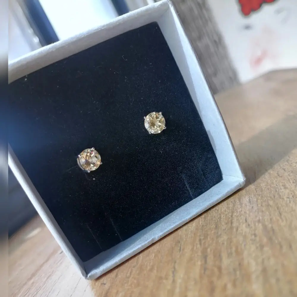 White gold silver claw precious citrine stud earrings in black jewelry box
