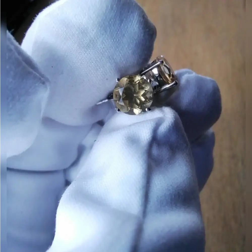 Silver rings with yellow gemstones in white gold silver claw settings for elegant jewelry