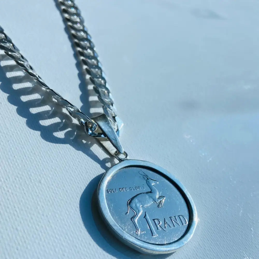 Silver flat curb necklace with South African 1 Rand coin pendant, Radiant Rand collection. jewellery silver jewellery. Deep Shine Jewellers