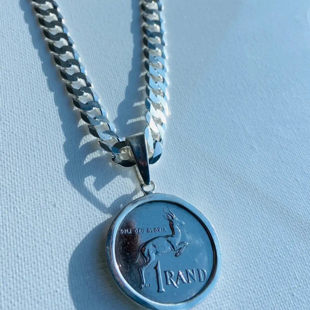 Silver flat curb necklace featuring a South African 1 Rand coin pendant. jewellery silver jewellery. Deep Shine Jewellers
