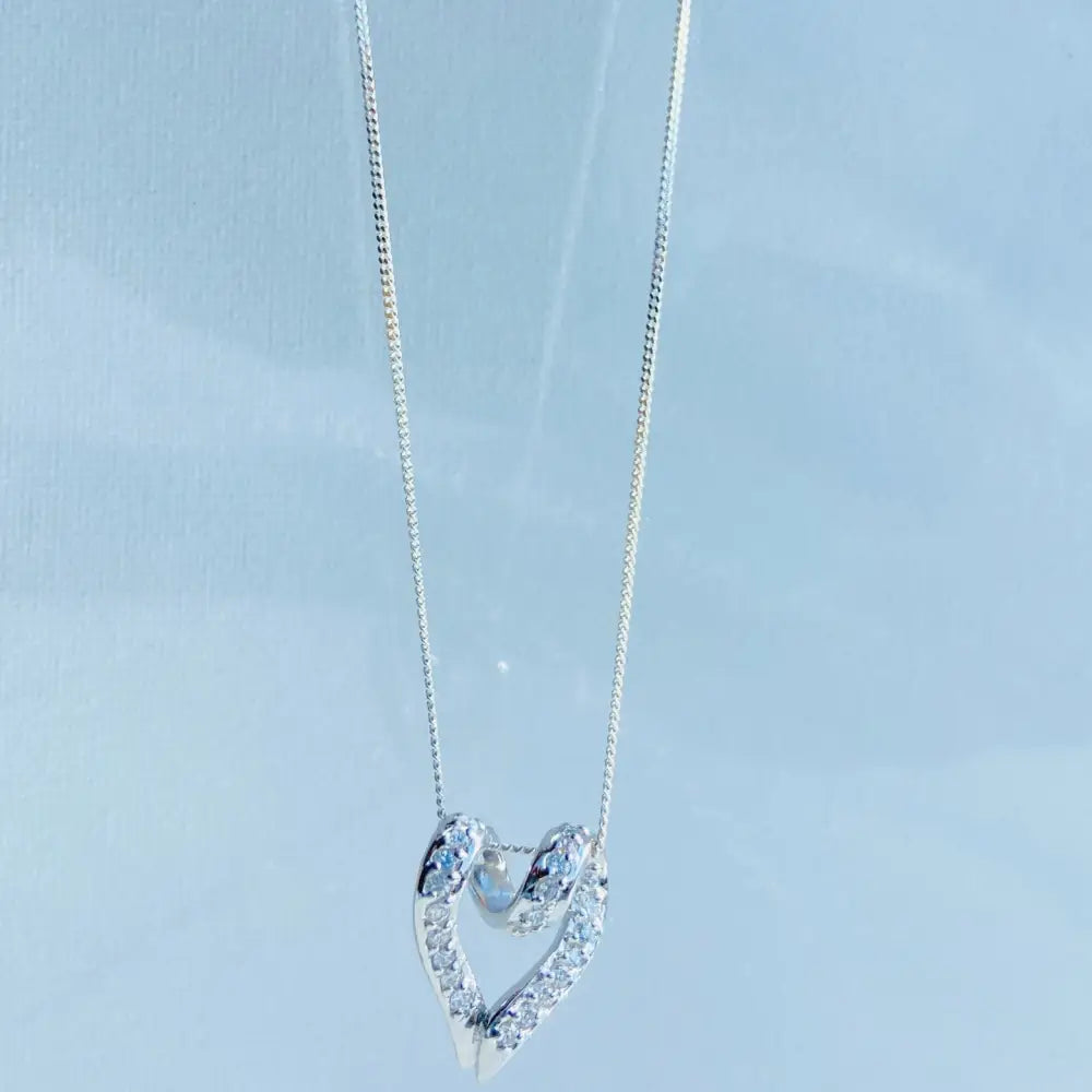 Silver looped heart necklace with diamond pendant, perfect for elegant white gold silver jewelry