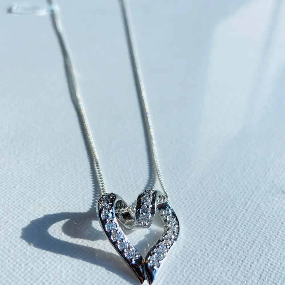 Silver looped heart necklace with diamond pendant, perfect for white gold silver jewelry