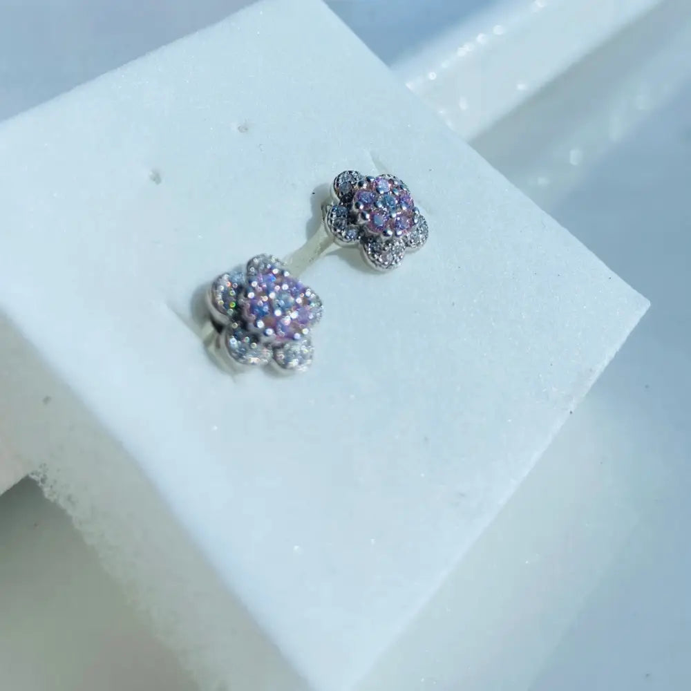 Pair of floral stud earrings in silver pink rose with pink and clear gemstones