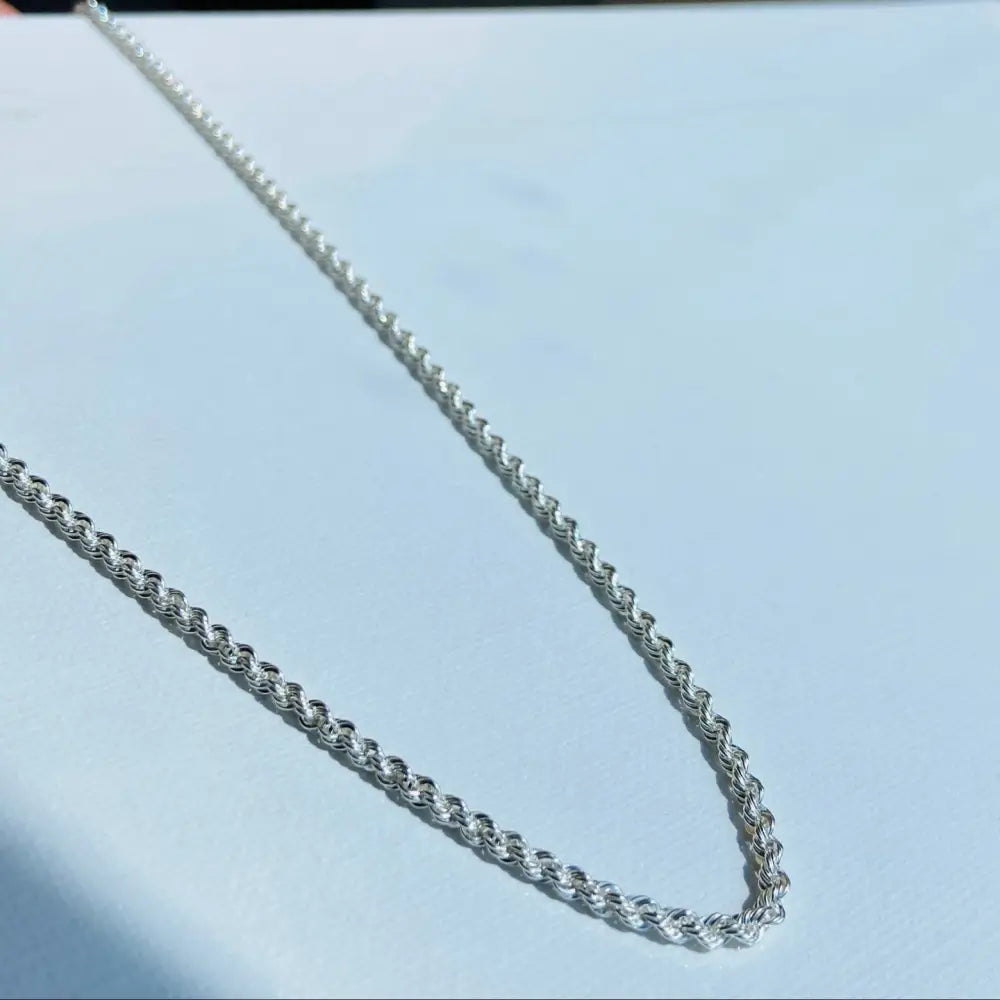 Shiny silver rope chain necklace showcasing a luxurious silver rope design for daily elegance