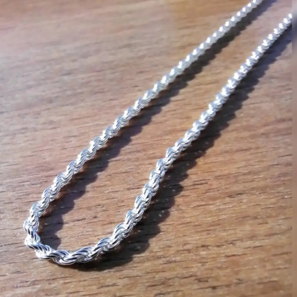 Shiny silver rope chain necklace showcasing the Radiant Silver Rope Chain design