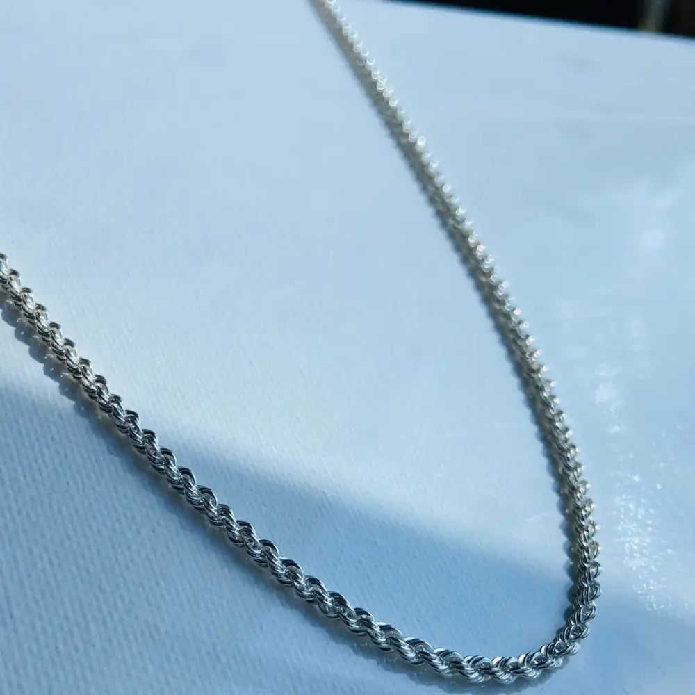 Lustrous silver rope chain necklace showcasing elegance and daily shine