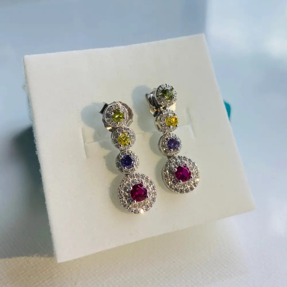 Alt text for Radiant White Gold Flooded Colourful Diamond Drop Earrings featuring bezel-set gemstones in white gold
