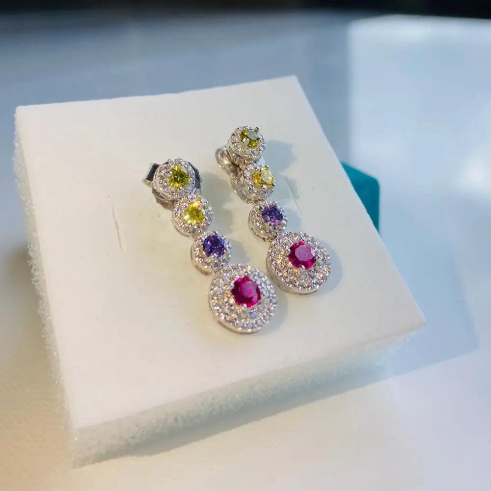 White gold flooded colourful diamond drop earrings with multi-colored gemstones and pavé diamonds