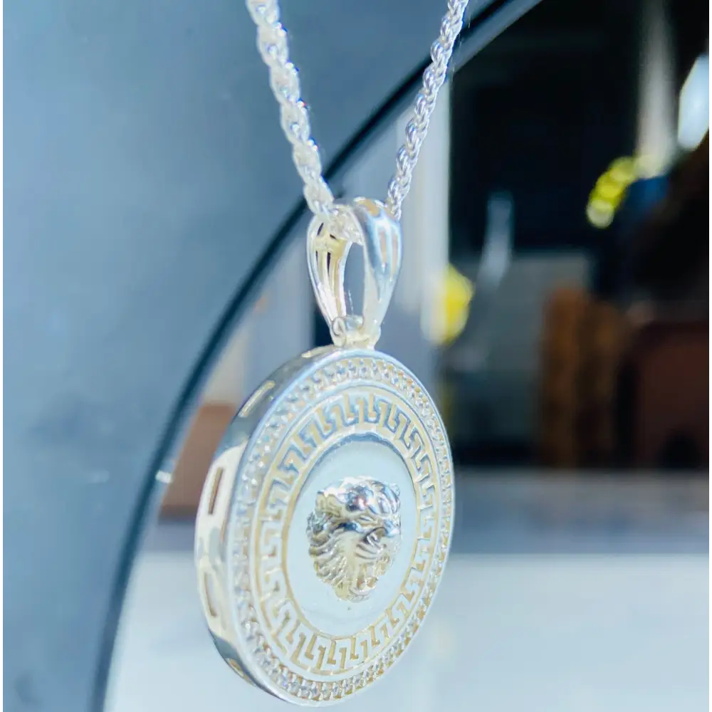 Silver-toned medallion pendant on a regal rope necklace with gemstones and Greek key design. Jewellery silver jewellery. Deep Shine Jewellery