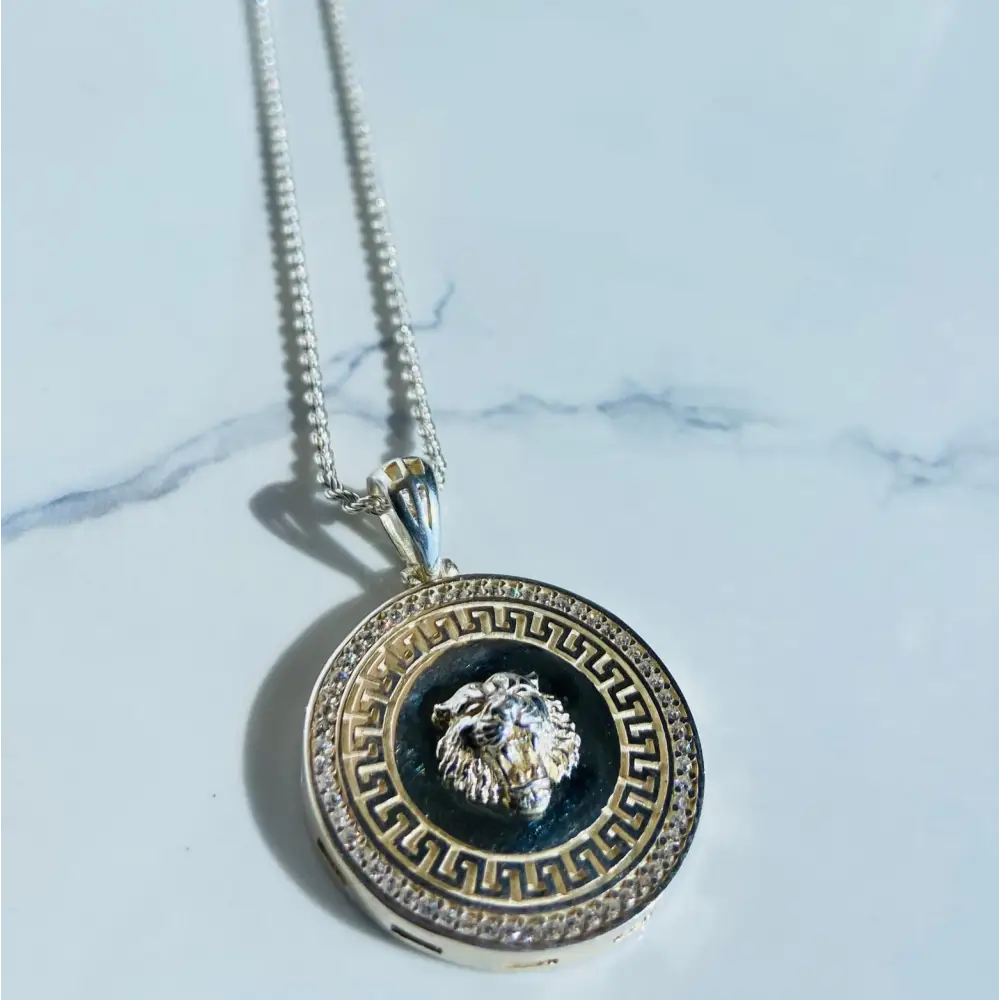 Silver rope necklace with lion’s head pendant, Greek key pattern, and gemstone border. Jewellery silver jewellery. Deep Shine Jewellery