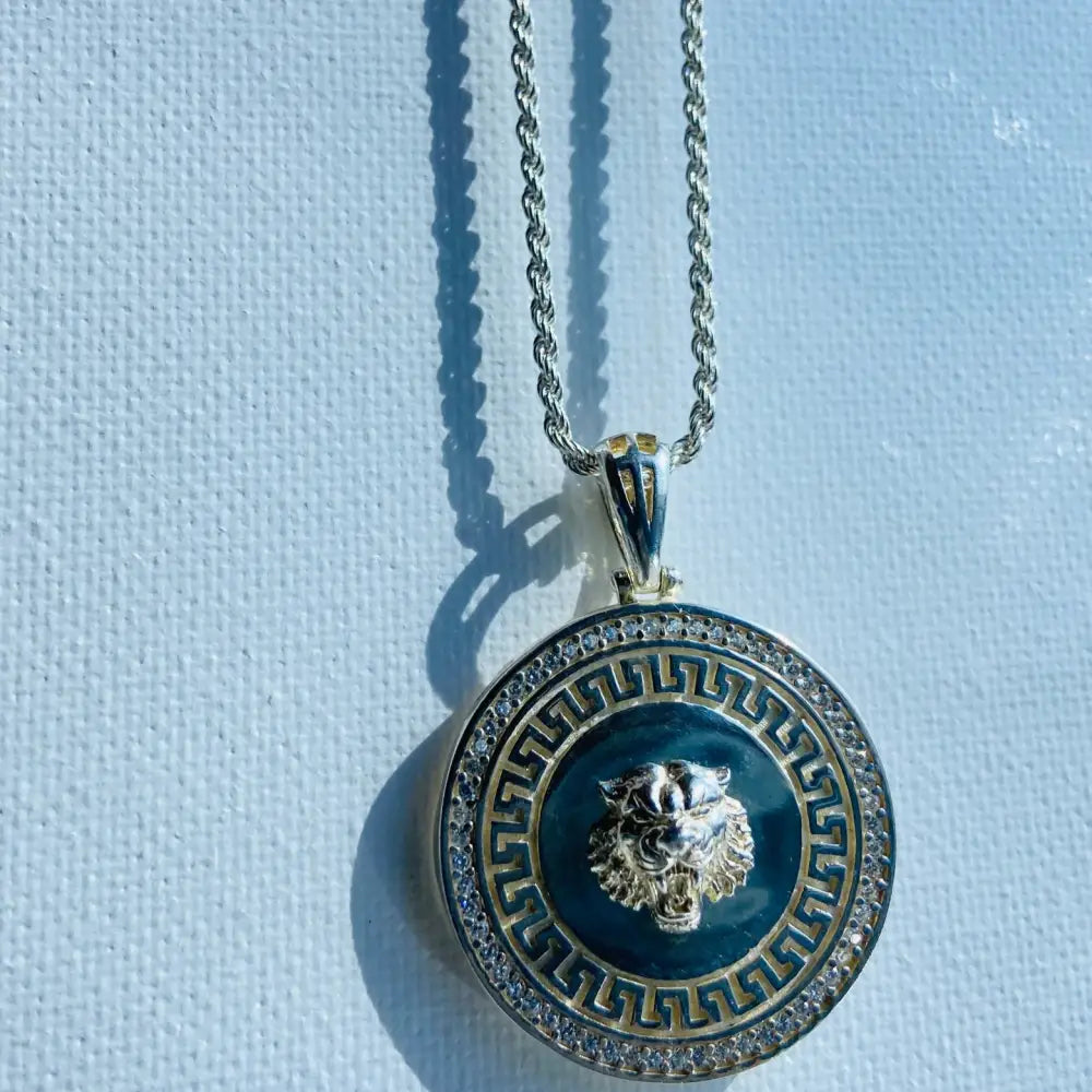 Silver rope necklace with tiger head medallion, Greek key pattern, and gemstone border. Jewellery silver jewellery. Deep Shine Jewellery