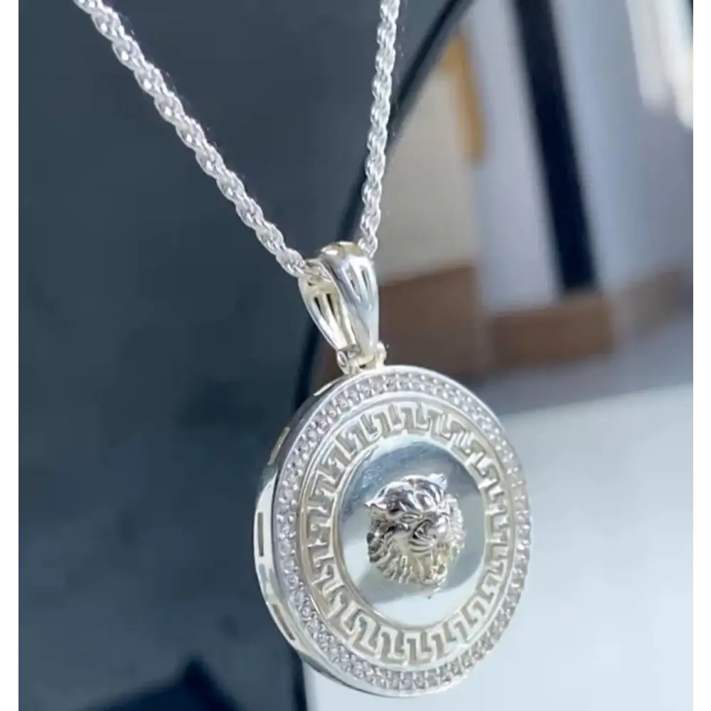 Silver rope necklace with lion medallion, Greek key pattern, and gemstone border. Jewellery silver jewellery. Deep Shine Jewellery