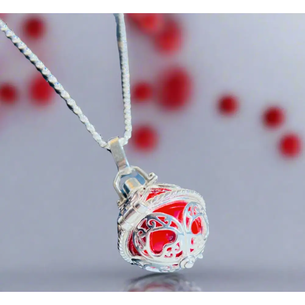 Silver locket casing with red stone in filigree design for Scarlet Heart Silver Locket Adornment. Jewellery silver jewellery. Deep Shine Jewellery