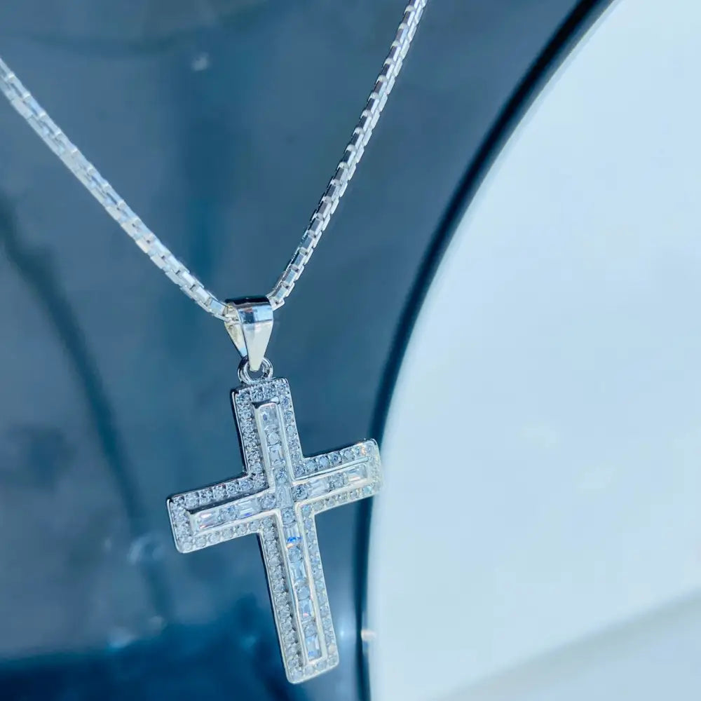 Sparkling silver flooded ice cross pendant with clear gemstones on delicate chain