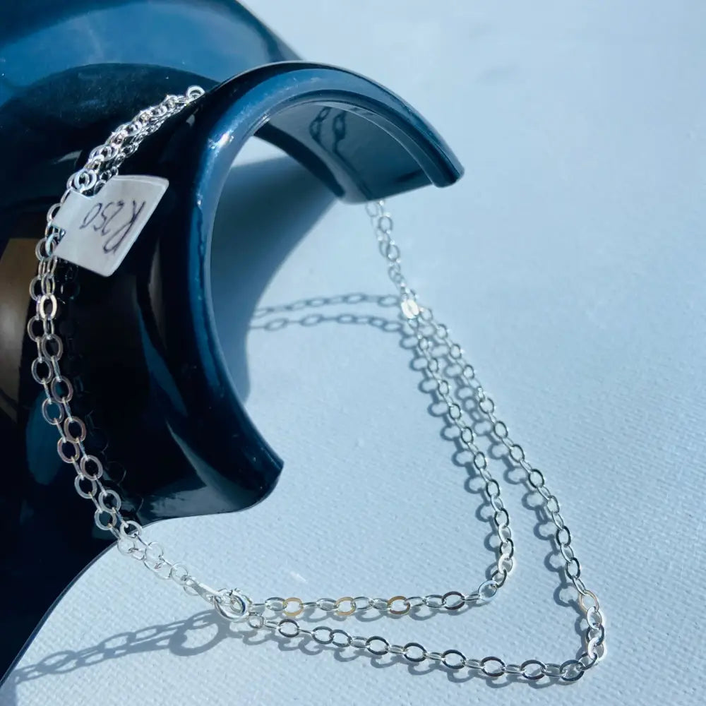 Silver cable chain necklace with spring-ring clasp, elegant jewelry accessory