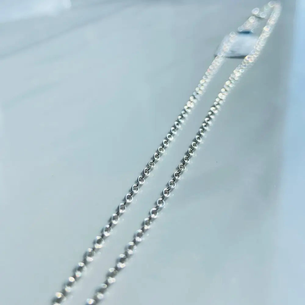 Shiny sterling silver cable chain showcasing a high-quality silver cable design