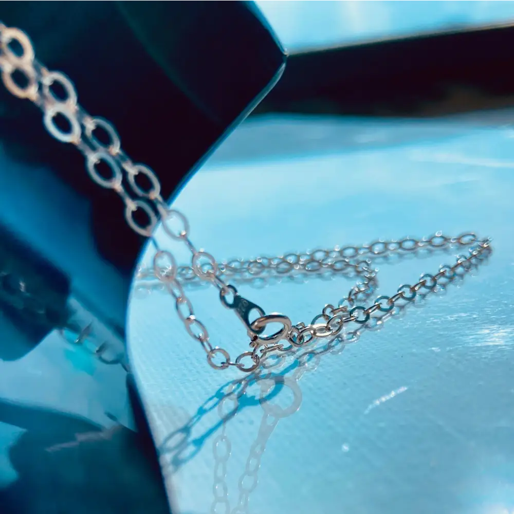 Silver cable chain necklace with lobster clasp for elegant jewelry styling