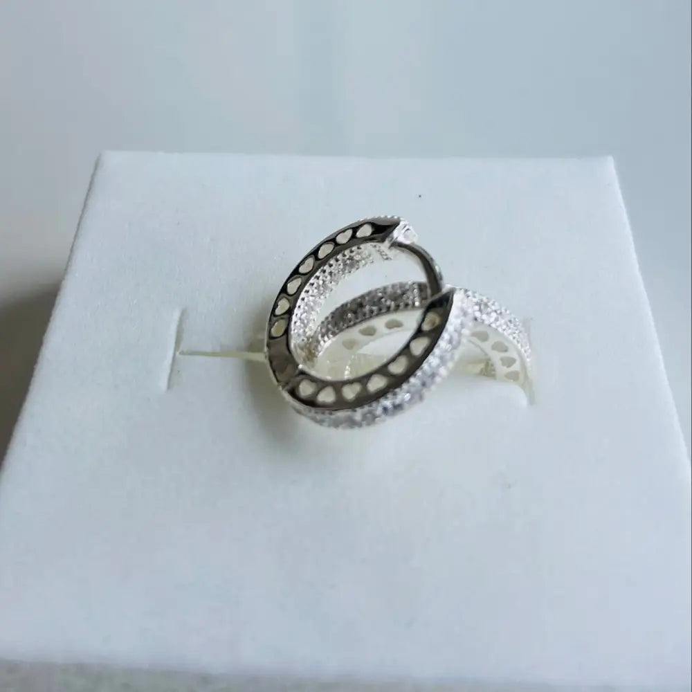 Silver flooded sleepers earrings with pave cubic zirconia and heart pattern for elegant style