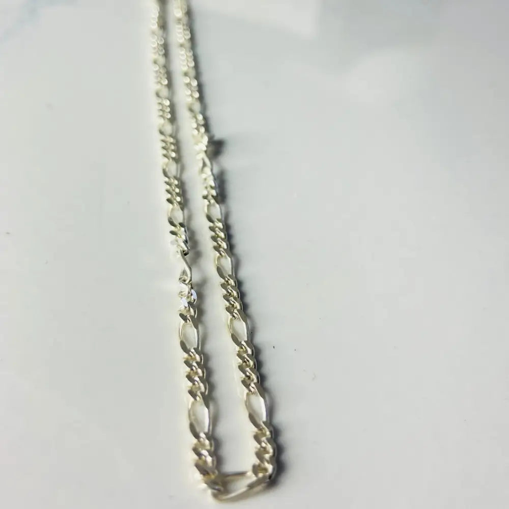 Shiny silver Figaro chain necklace in white gold silver finish for elegant style. jewellery silver jewellery