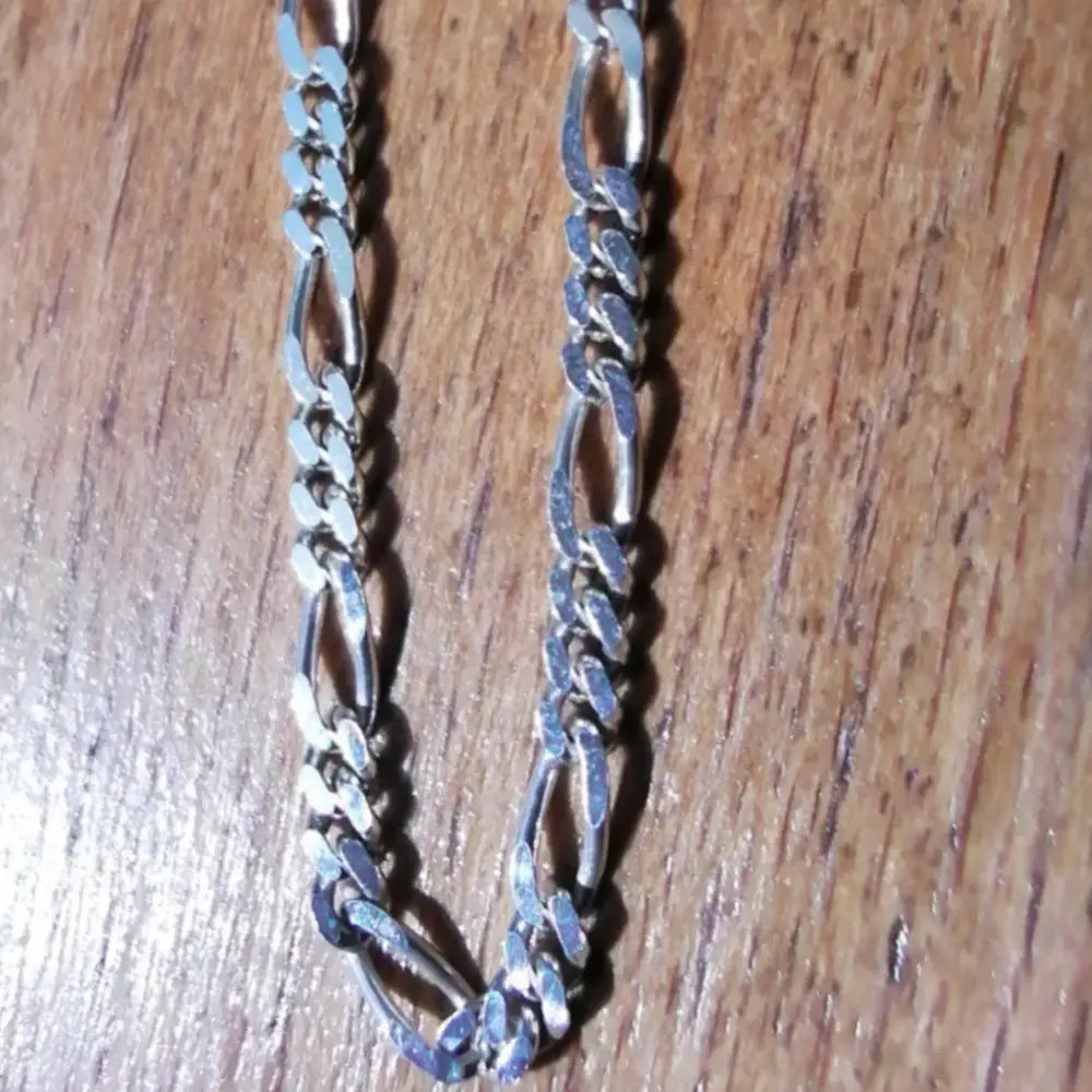 Shiny silver-colored Figaro chain necklace in white gold silver finish. jewellery silver jewellery. Deep Shine Jewellers