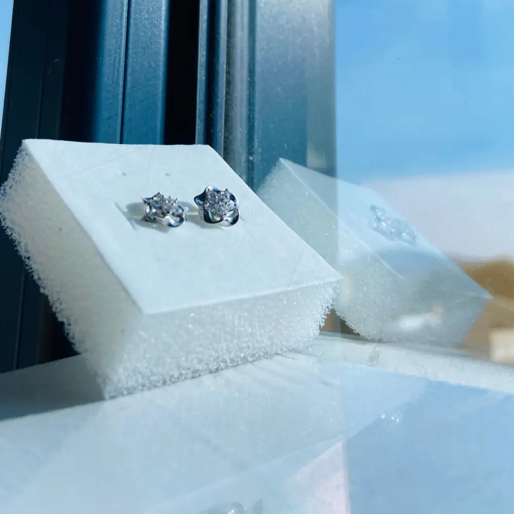 White gold silver ice pave flower stud earrings with clear gemstone clusters