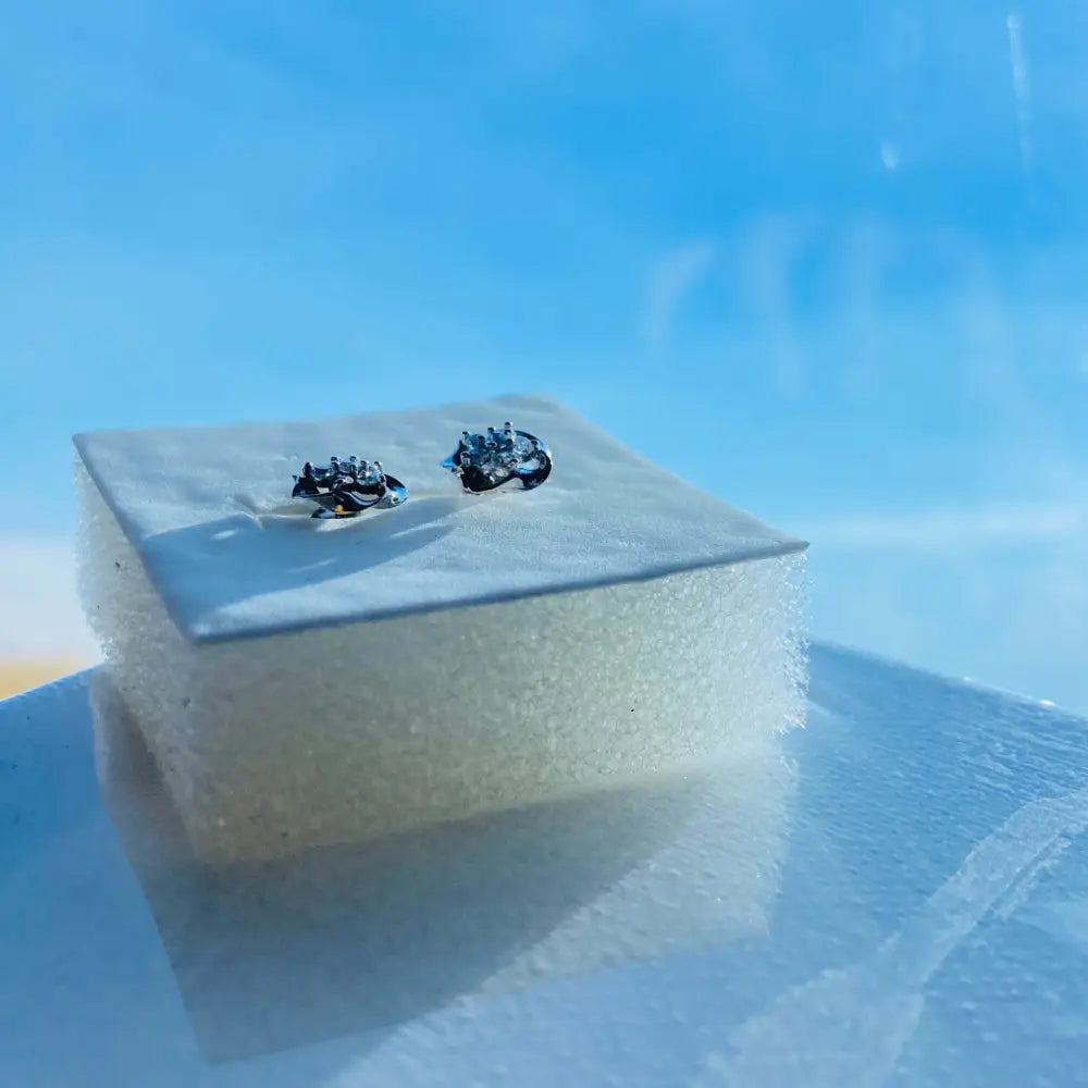 White gold silver hedgehog-shaped stud earrings from White Gold Silver Ice Pave Flower collection