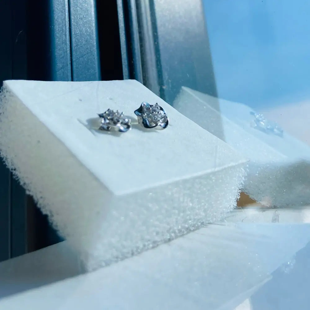 White Gold Silver Ice Pave Flower Stud Earrings with sparkling floral design